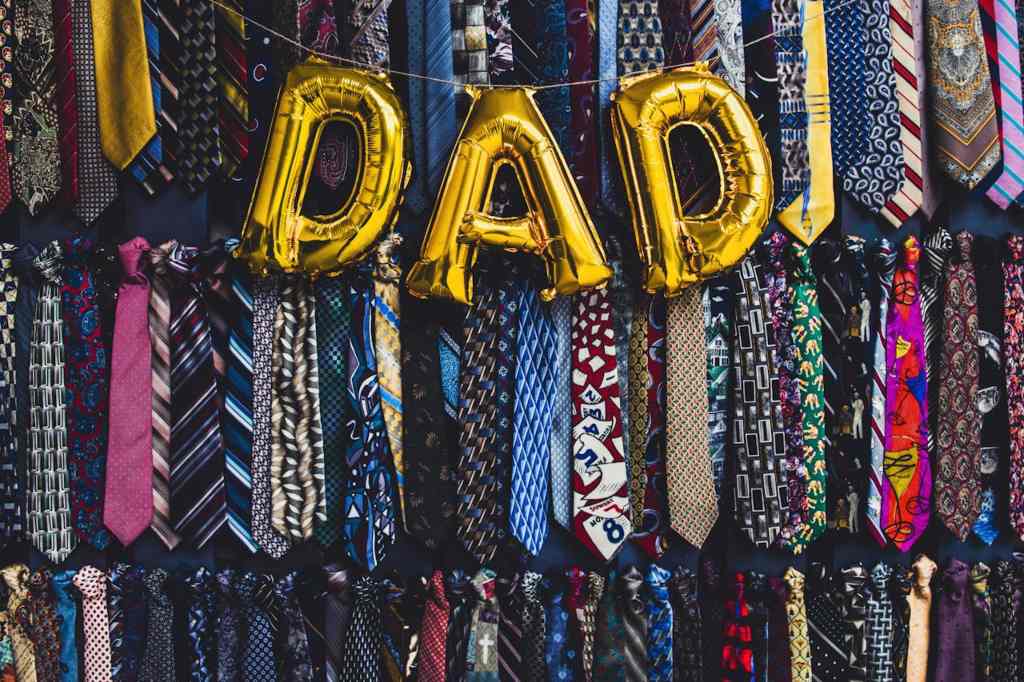 Balloons and colorful ties as gifts and clothing for dad.