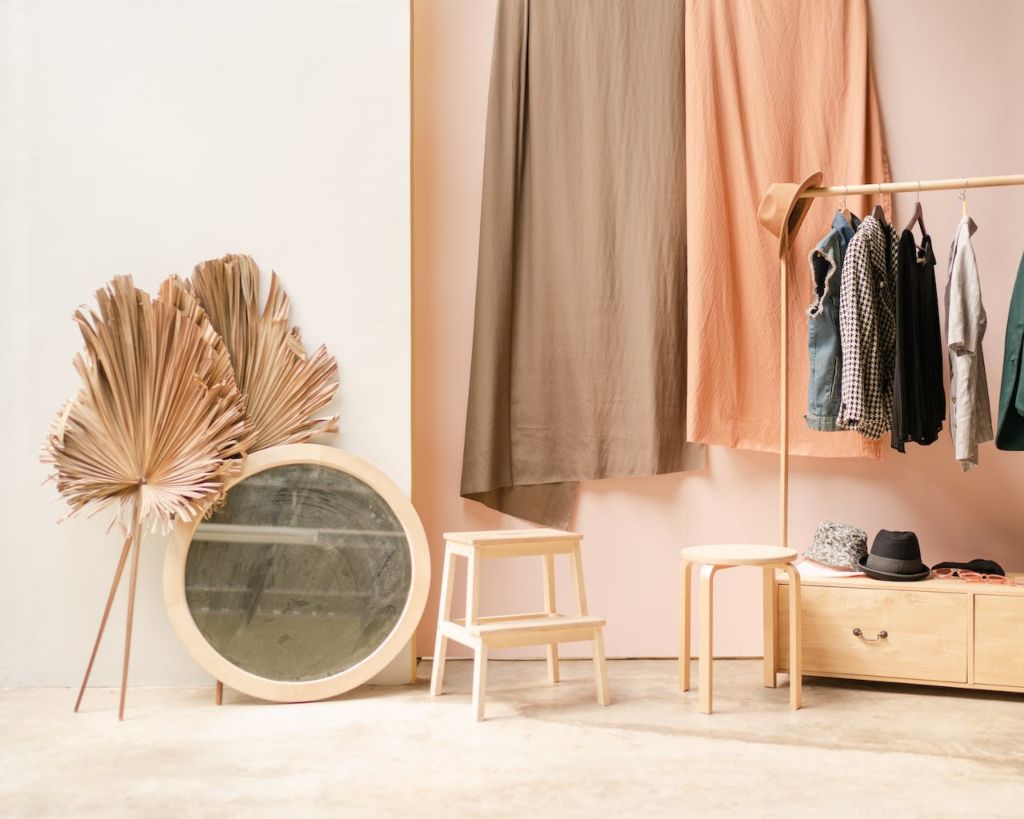 Open space closet featuring a few women’s capsule wardrobe garments