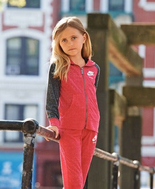 A girl in Nike tracksuit