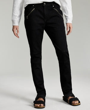 Model shown from the waist down in clearance men’s jeans.