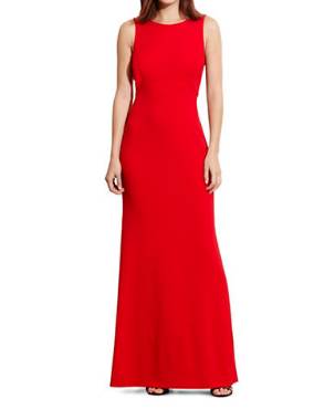 A woman modeling a red dress from the Ralph Lauren sale outlet.